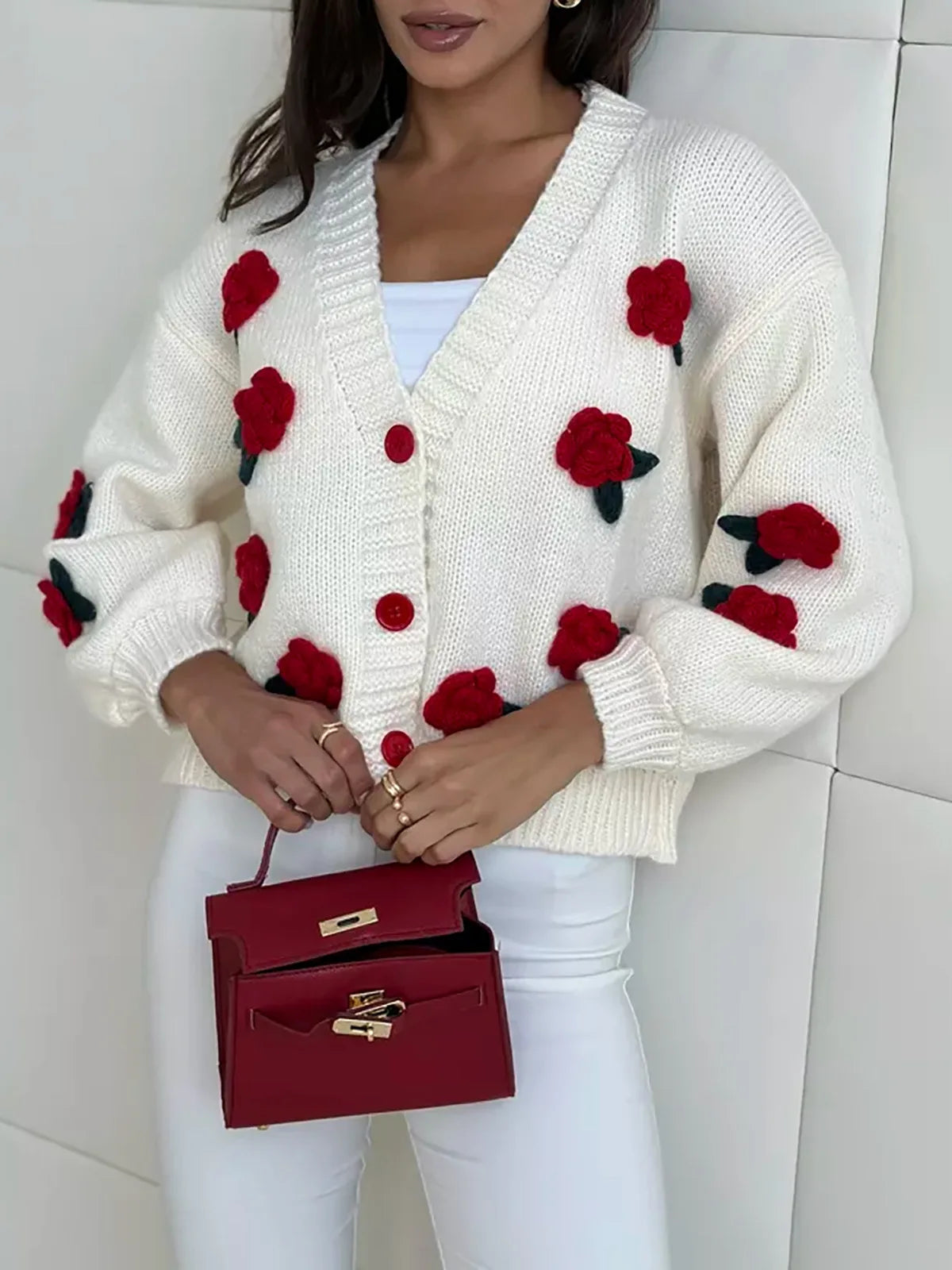 Maglia con Applicazioni Floreali e Scollo a V